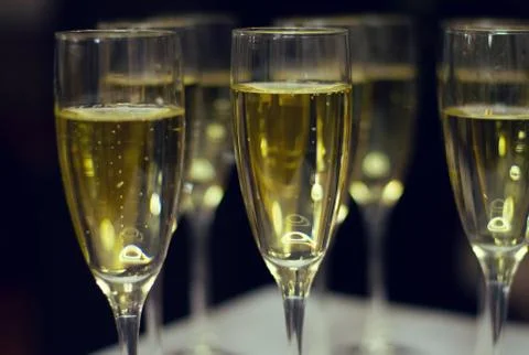 Glasses of champagne on a table. Stock Photos
