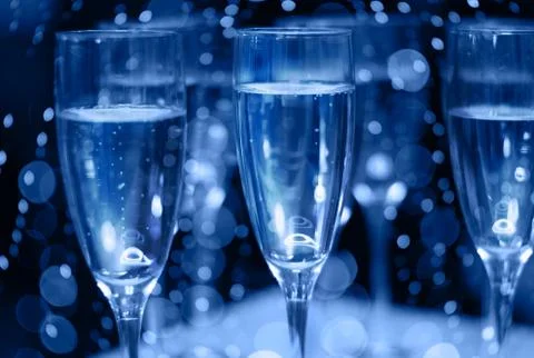 Glasses of champagne on a table. Stock Photos