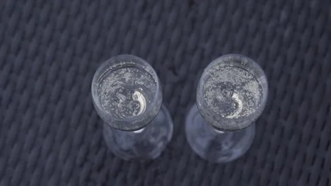 Glasses of champagne, top view, bubbles coming out Video stock 306148807