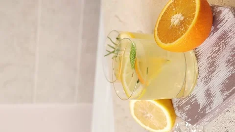 Glasses with citrus lemonade, summer soft drink, top view Stock Footage 151076879