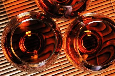 Glasses of cognac on the table 스톡 사진
