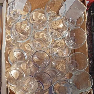 Glasses in crate Stock Photos