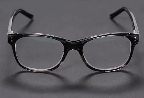 Glasses on a dark background Stock Photos
