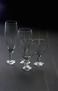 Glasses on a dark background Stock Photos