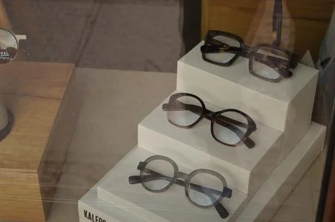 Glasses display case, close-up, close-up view from a great angle Stock Photos