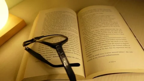 Glasses falling on the book - Sound off 스톡 동영상 143002783