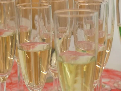 Glasses filled with champagne Stock Footage 82700444