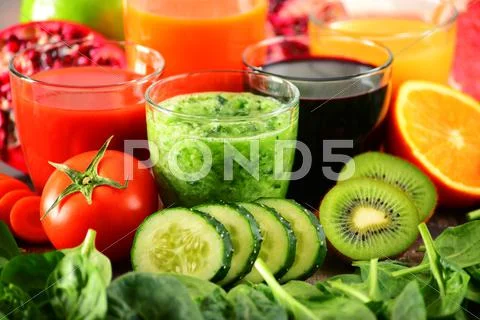 Glasses of fresh organic vegetable and fruit juices. Detox diet. Stock Photos