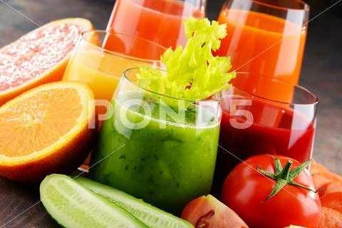 Glasses with fresh organic vegetable and fruit juices. Detox diet Stock Photos