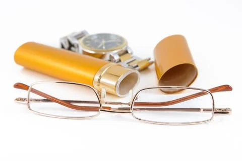 Glasses in gold case Stock Photos