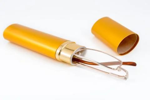 Glasses in gold case Stock Photos
