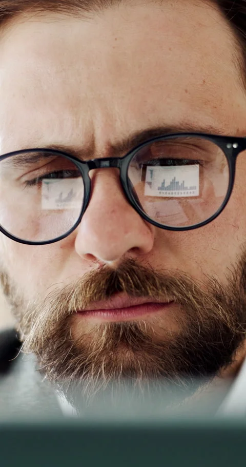 Glasses, graph and business man on computer for financial review, profit growth Stock Footage 330632653