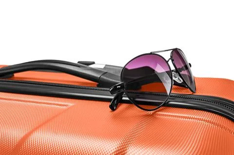 Glasses on gray suitcase Foto stock