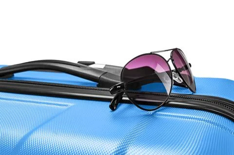 Glasses on gray suitcase Foto stock