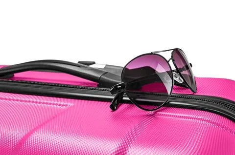 Glasses on gray suitcase Stock Photos