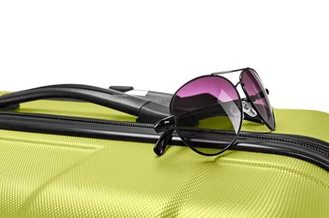 Glasses on gray suitcase Stock Photos