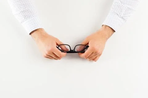 Glasses in hand. Stock Photos