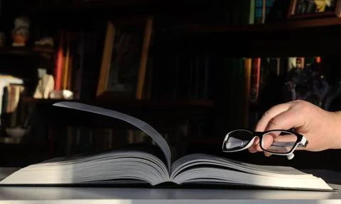Glasses in the hand Stock Photos