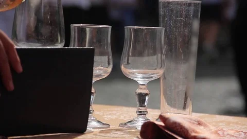 Glasses left on a restaurant table Stock Footage 80604236