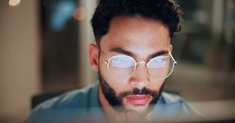 Glasses, man and computer research in office for global market activity, stocks Stock Footage 336307374