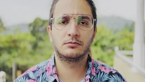 Glasses man looking at camera Stock Footage 231481356
