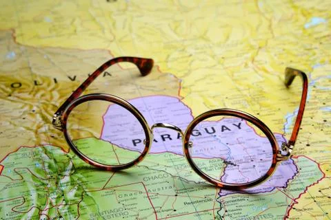 Glasses on a map - Asuncion Stock Photos