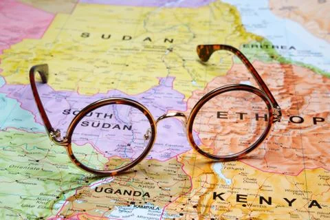 Glasses on a map - Juba Stock Photos