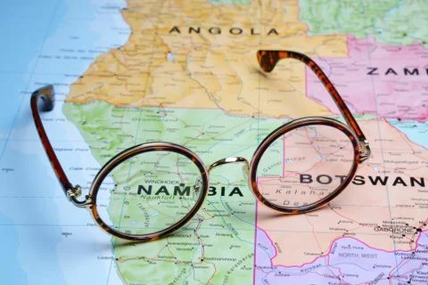 Glasses on a map - Windhoek Stock Photos