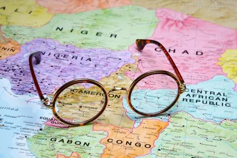Glasses on a map - Yaounde Stock Photos