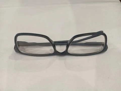 A glasses with metal frame down side Stock Photos