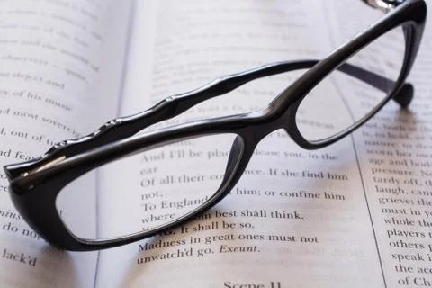 Glasses on the Open Book. Foto stock
