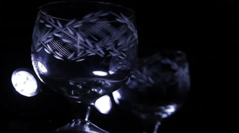 Glasses with a pattern on a dark background Stock Footage 60810037