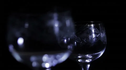 Glasses with a pattern on a dark background Stock Footage 60833068