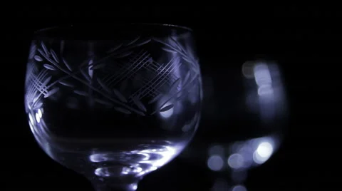 Glasses with a pattern on a dark background Stock Footage 60833088