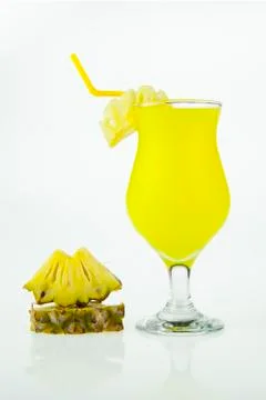 Glasses of pineapple juice Stock Photos