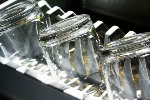Glasses in rack Stock Photos