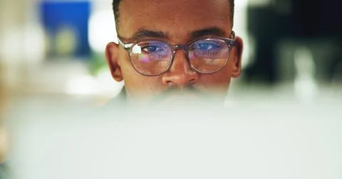 Glasses, reading and man with computer in office for social media marketing.. Stock Photos