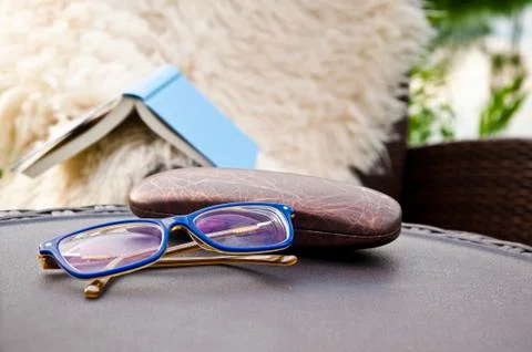 Glasses for reading with book in the background Stock Photos
