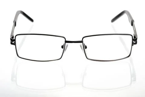 Glasses Rectangular glasses in a thin metal frame on a white background Co... Stock Photos