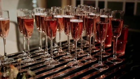  Glasses with red sparkling drink Stock Footage 303533874