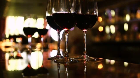Glasses of red wine on the bar Stock Footage 120565630