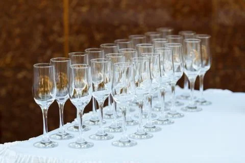 Glasses in a row at a buffet table Stock Photos