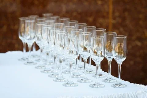 Glasses in a row at a buffet table Stock Photos