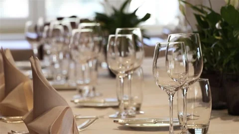 Glasses shift into focus at a high-end restaurant Stock Footage 343413946