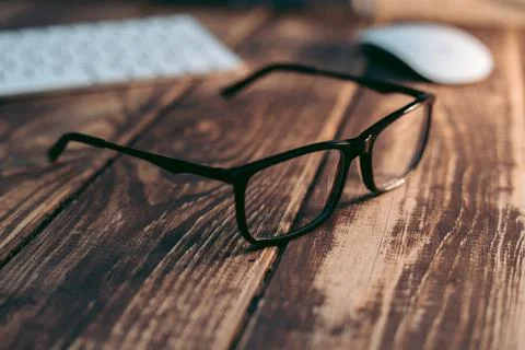 Glasses for sight and vision correction and protection from computer on the w Stock Photos