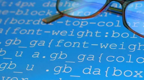 Glasses. Source program code. Stock Footage 53763135