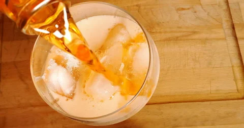 Glasses of spritz aperitif aperol cocktail with orange slices and ice cubes Видео 252138962