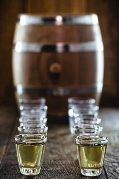 Glasses of tequila on the bar table Stock Photos