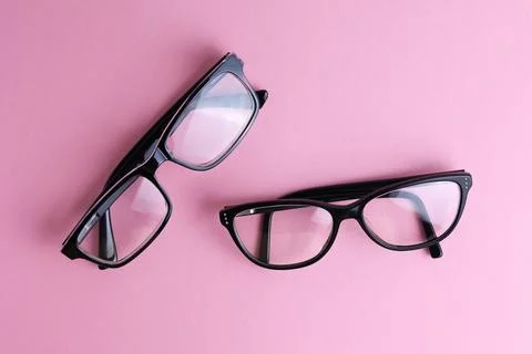 Glasses for vision correction on a colored background with space for text Stock Photos