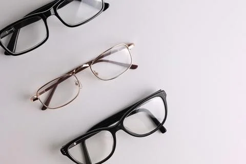 Glasses for vision correction on a light background with a place for text Stock Photos